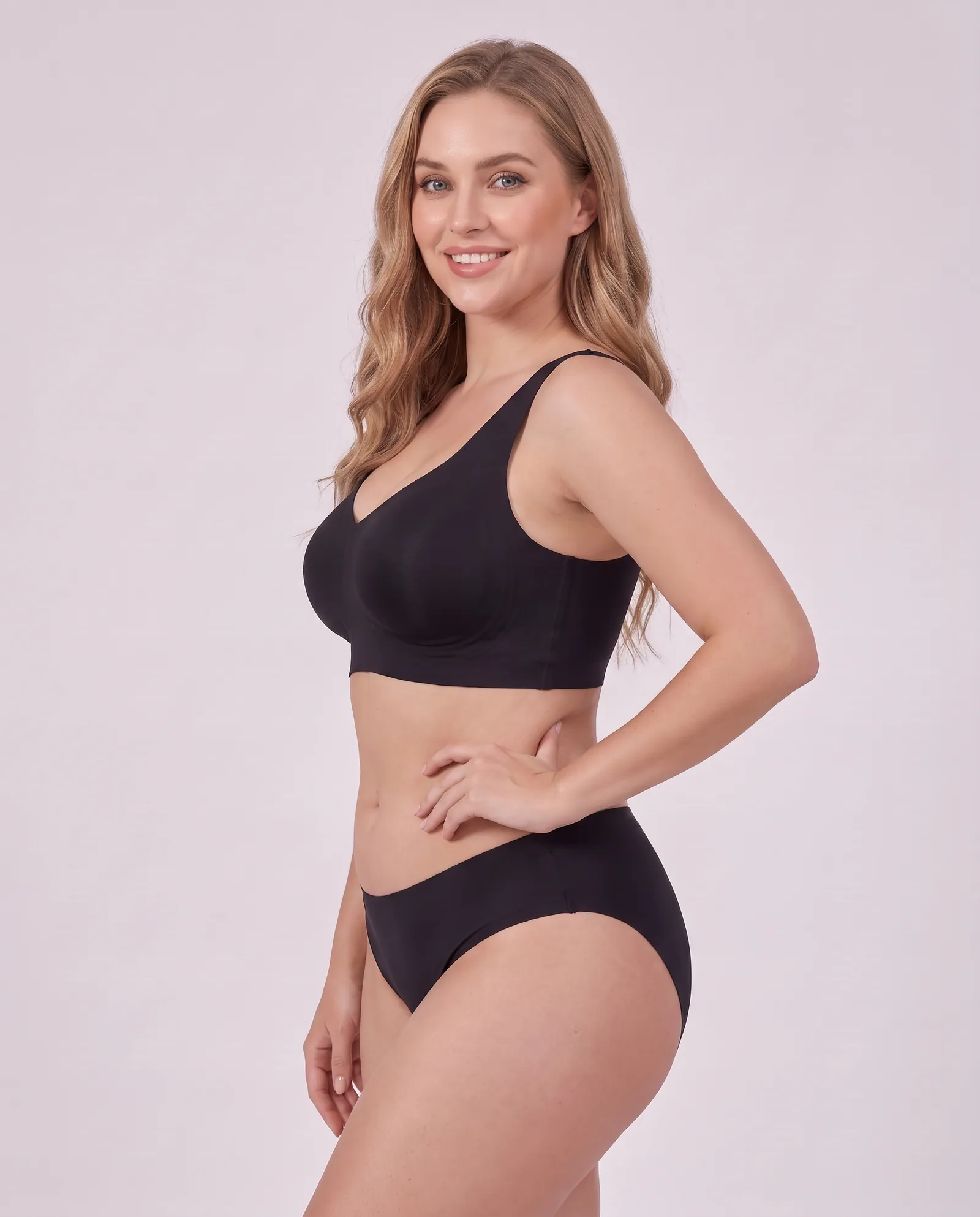 The PerkUp Jelly Bra in Black, side profile on model showing the lift